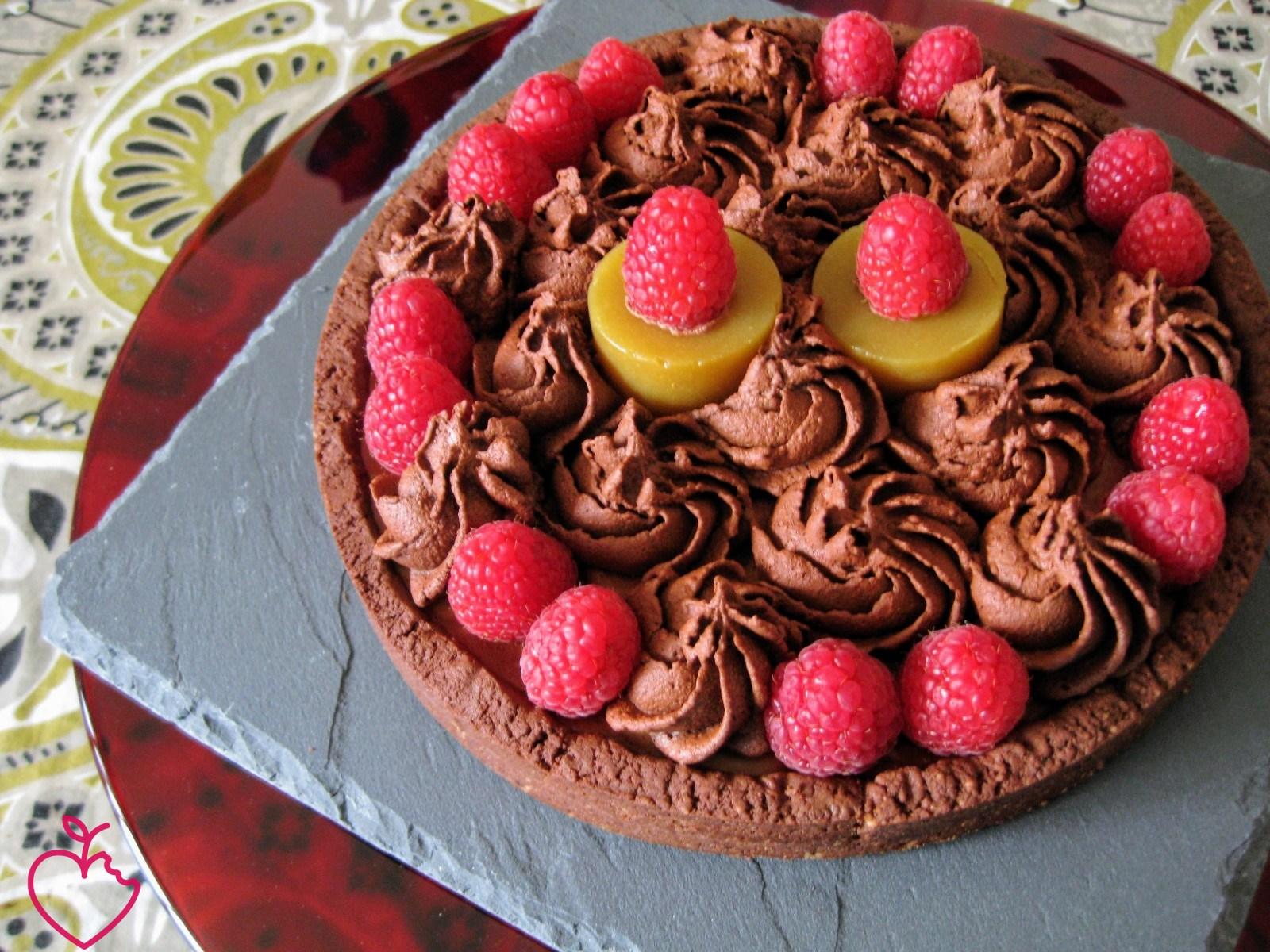 Crostata nocciole, fondente e lamponi